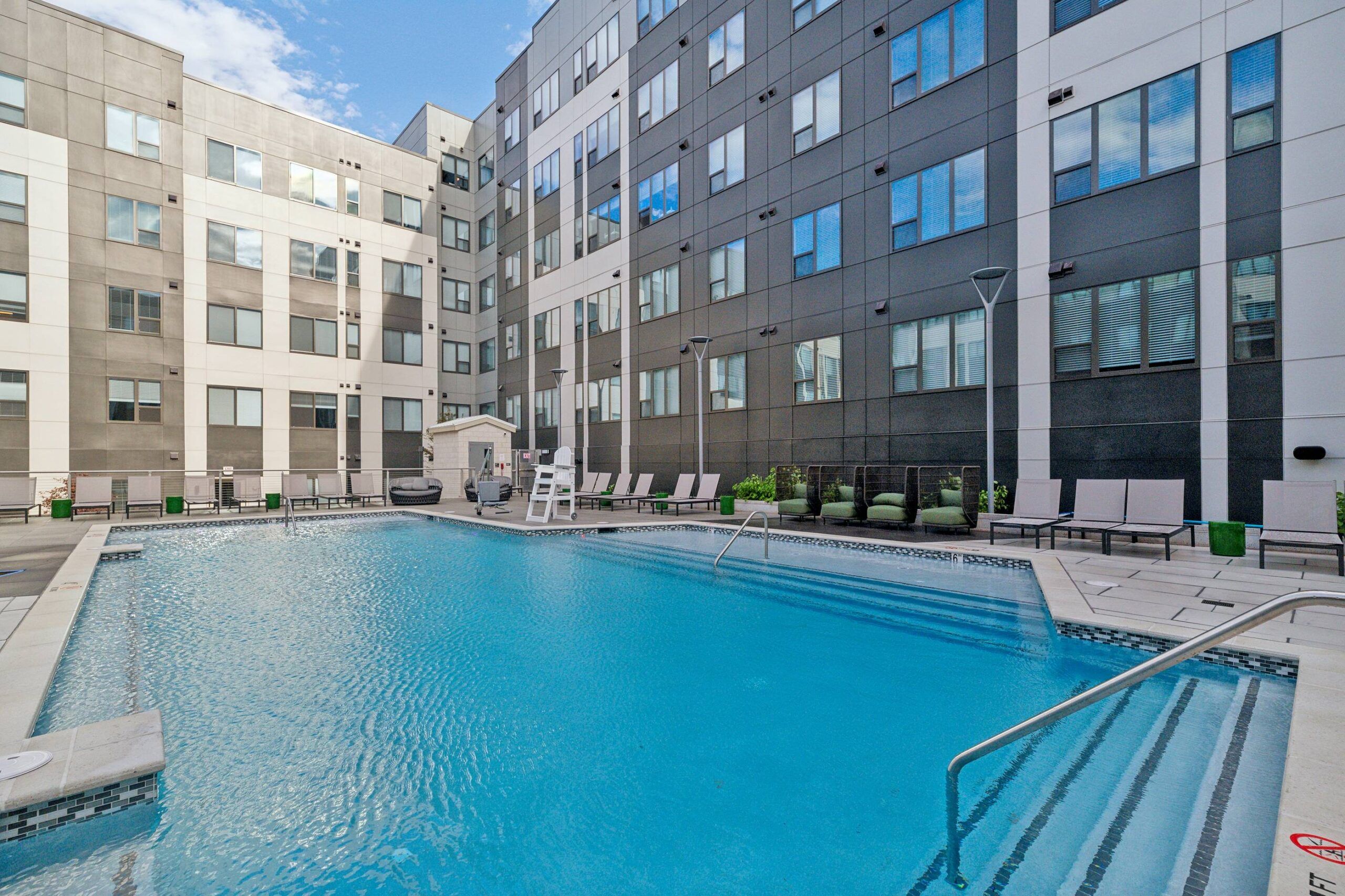 The Main On university student apartment pool amenity
